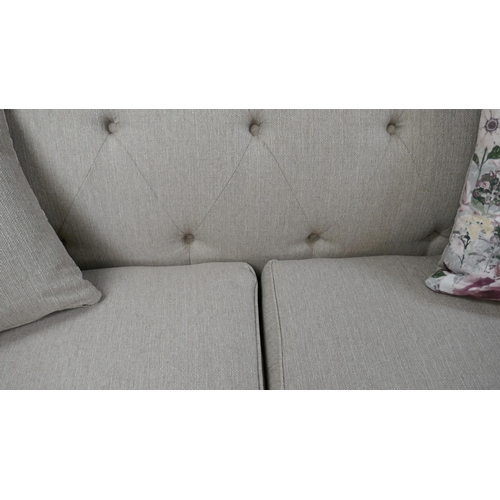 1351 - An oatmeal weave Chesterfield 2.5 seater sofa RRP £1279