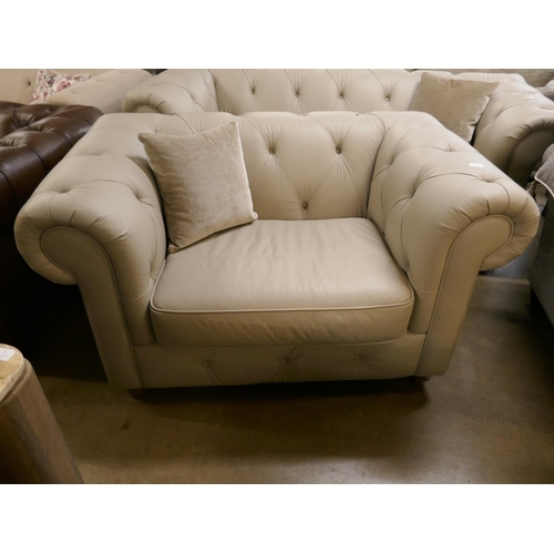 1358 - A stone leather Chesterfield three seater sofa and love seat, brand new RRP £2658