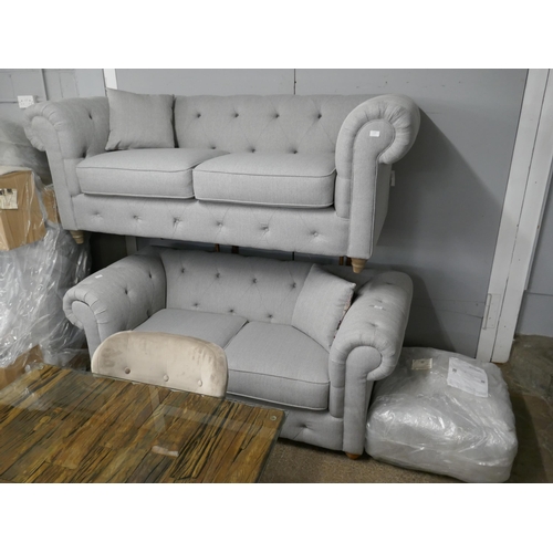 1378 - A grey weave Chesterfield three seater sofa, two seater sofa and footstool RRP £2568