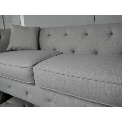 1378 - A grey weave Chesterfield three seater sofa, two seater sofa and footstool RRP £2568