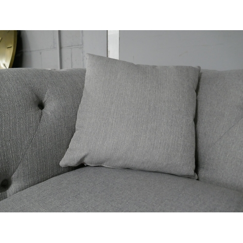 1378 - A grey weave Chesterfield three seater sofa, two seater sofa and footstool RRP £2568