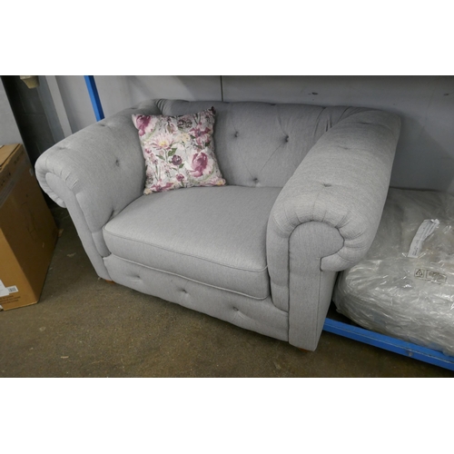 1388 - A grey weave Chesterfield three seater sofa, love seat and footstool RRP £2458