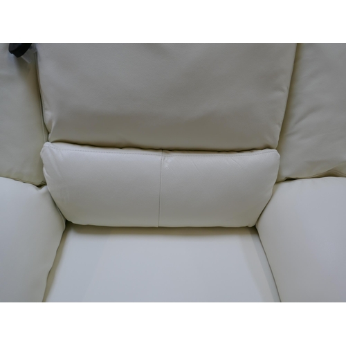 1396 - A SCS Fallon electric reclining cream leather three seater sofa and a pair of electric reclining cha... 