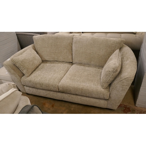 1407 - A pewter weave three seater sofa