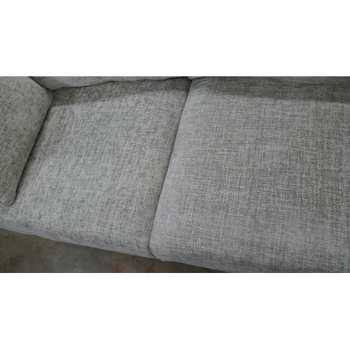 1407 - A pewter weave three seater sofa