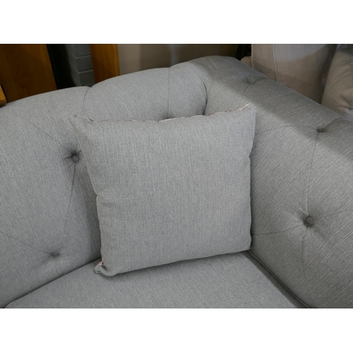 1413 - A grey weave Chesterfield 2.5 seater sofa and footstool RRP £1279