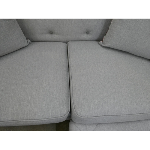 1413 - A grey weave Chesterfield 2.5 seater sofa and footstool RRP £1279