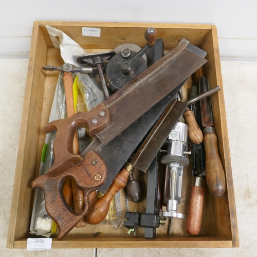 2028 - A box of assorted tools including saws, drills, locks, clamps, hammers etc.