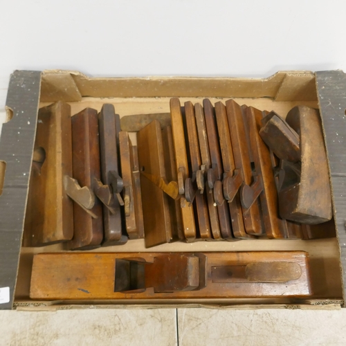 2029 - A box of various planes including wooden block planes, shaping planes, etc.