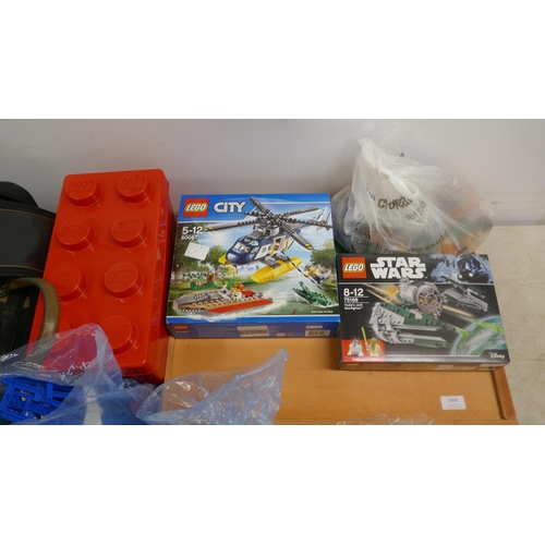 2066 - A large quantity of Lego including Lego Star Wars Yoda's Jedi fighter and Lego City helicopter