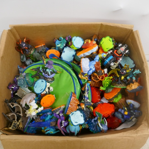 2072 - A box containing a large quantity of various Skylanders toys