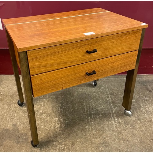 46 - A teak sewing table