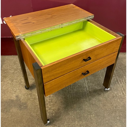 46 - A teak sewing table