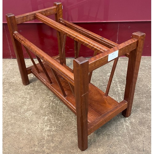 47 - A teak magazine rack