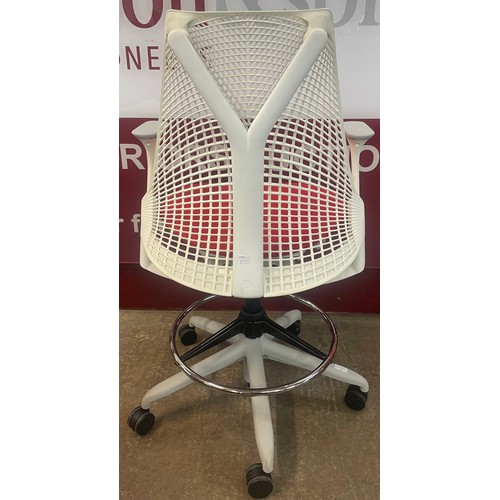 54 - A Herman Miller revolving white Sayl desk chair