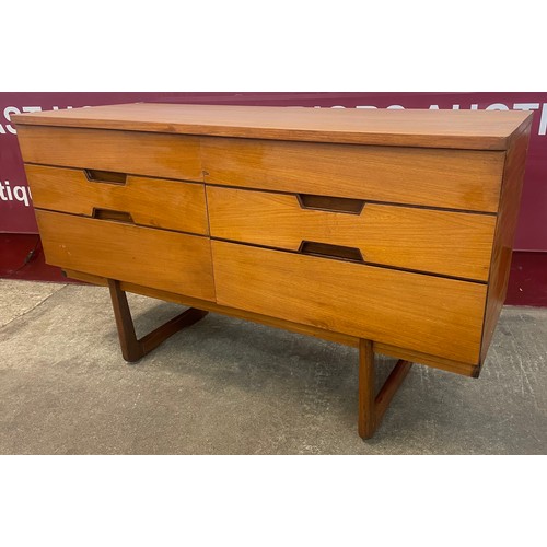 57 - A Uniflex teak six drawer sideboard