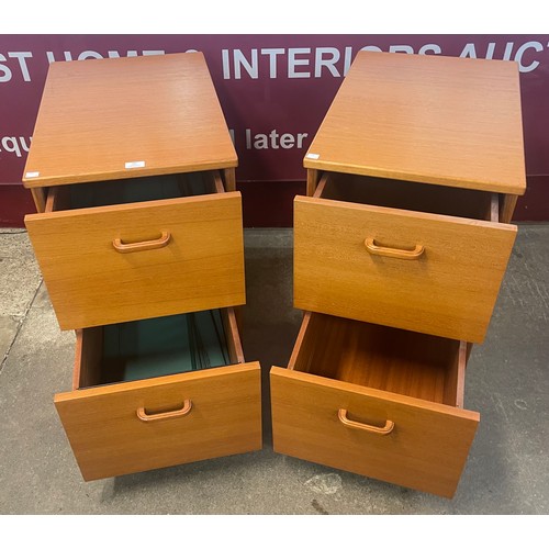 60 - A pair of teak two drawer filing cabinets