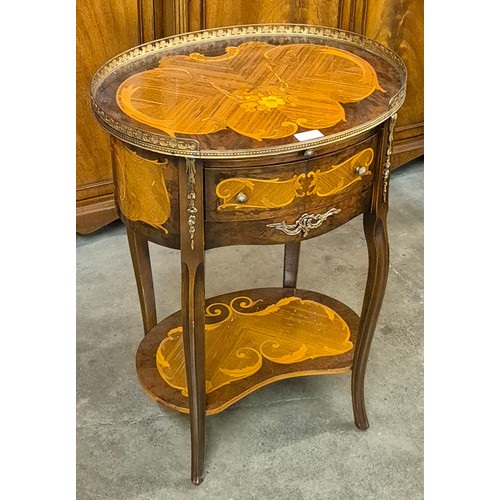 101 - A French Louis XV style marquetry inlaid walnut and ormolu mounted table de nuit