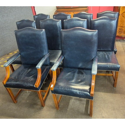 102 - A set of ten Gainsborough style mahogany and blue leather upholstered library chairs