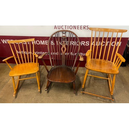 97 - Two Scandinavian beech rocking chairs and an Ercol Golden Dawn fleur de lys rocking chair