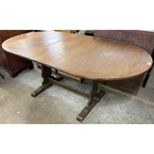 202 - An Old Charm oak extending dining table