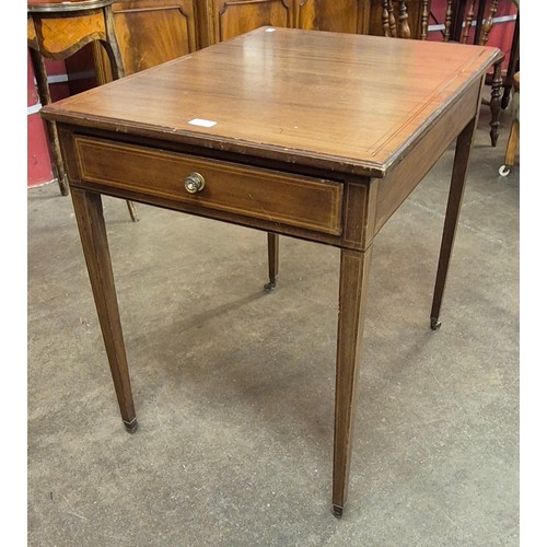 105 - An Edward VII inlaid mahogany two drawer writing table