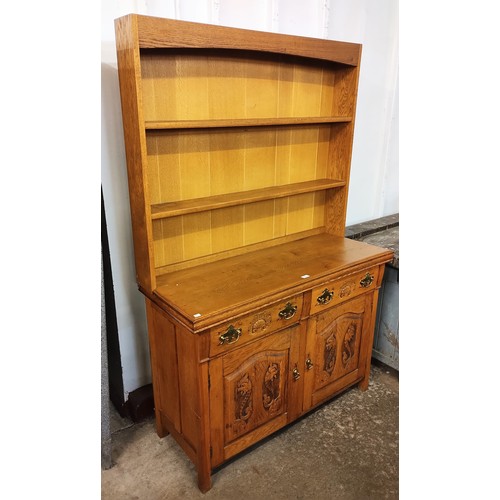 222 - A French style carved oak dresser