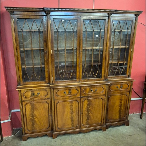 110 - A George III style mahogany breakfront library bookcase