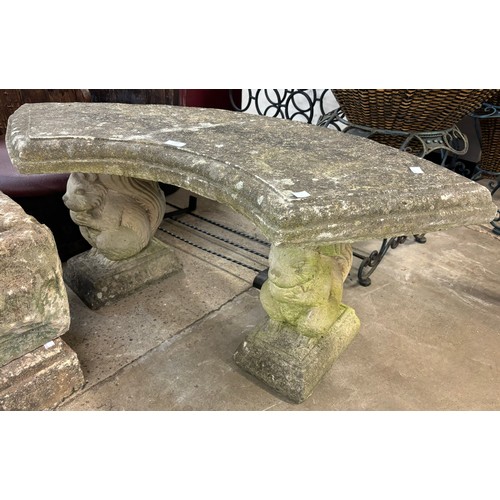 227 - A cast concrete garden bench