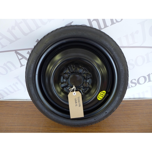 2258 - A collection of automotive items including a Toyota Yaris spare wheel with a Bridgestone T8803 T 115... 