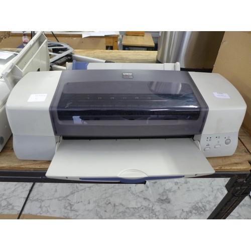 2260 - An Epson Stylus Photo 1270 printer with a software disk