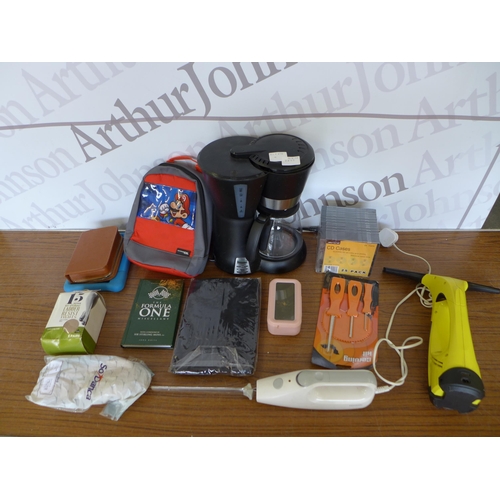 2277 - A quantity of miscellaneous items  including a Karcher WV50 window cleaner with charger, a Bestek, a... 