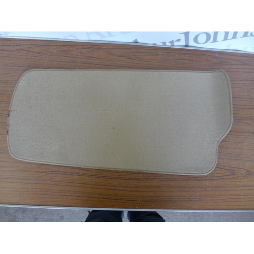 2279 - A set of beige fabric car mats