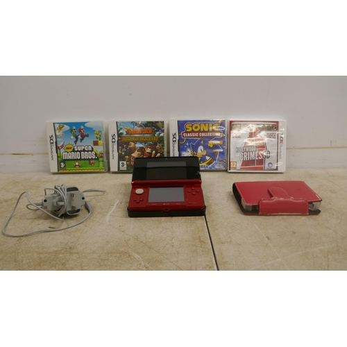 2084 - A metallic red Nintendo 3DS games console with assorted games including Donkey Kong, Sonic Classic C... 