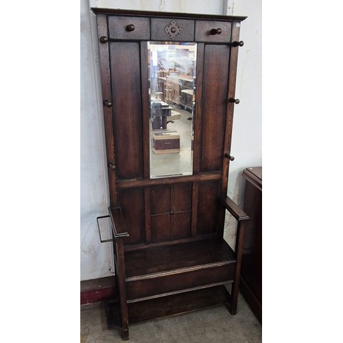 120 - An early 20th Century carved oak hallstand