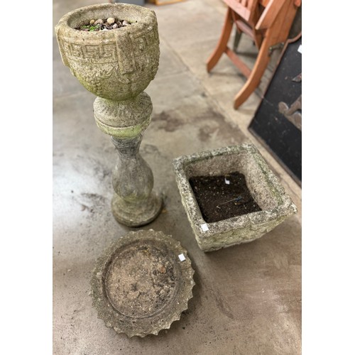 248 - A concrete garden planter, a jardiniere on stand and one other