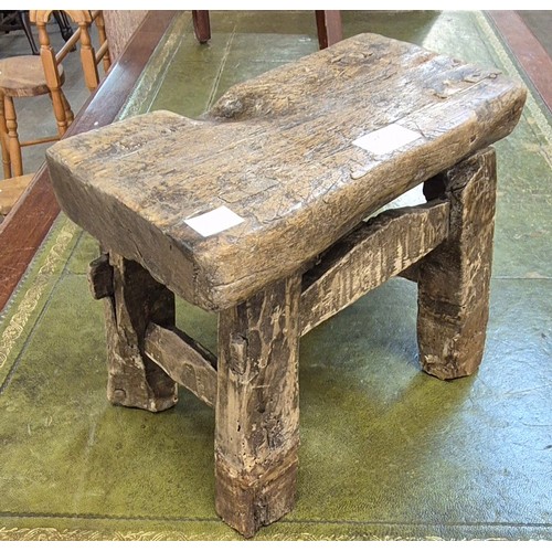 125 - A small 19th Century primitive pine milking stool