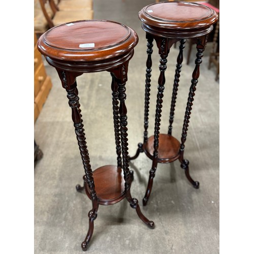 165 - A pair of Hepplewhite style mahogany barleytwist jardiniere stands