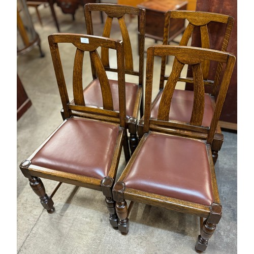 176 - A set of four early 20th Century dining chairs