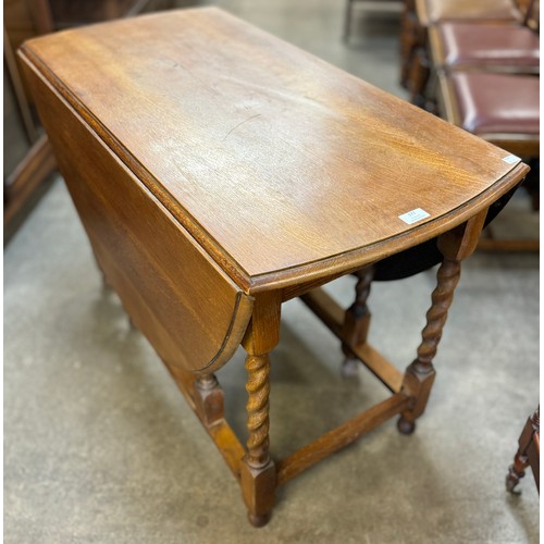 177 - An early 20th Century oak barleytwist gateleg table