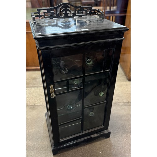 188 - A Victorian Aesthetic Movement ebonised pier cabinet