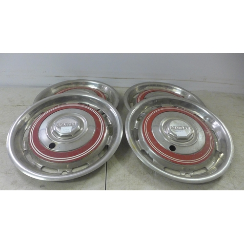 2044A - A set of four vintage stainless steel Bentley hub cap wheel covers