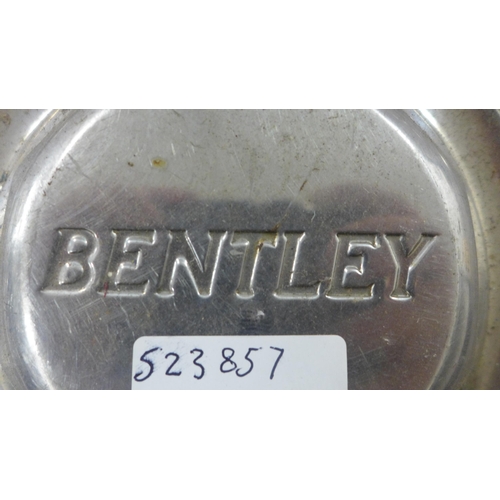 2044A - A set of four vintage stainless steel Bentley hub cap wheel covers