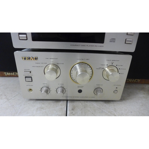 2104 - A quantity of stereo equipment including a Teac R-H300 cassette deck, a Teac T-H300 AM/FM tuner, a T... 