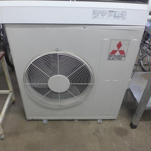 2119 - A Mitsubishi Electric wide and long air flow G-Inverter air con unit with remote