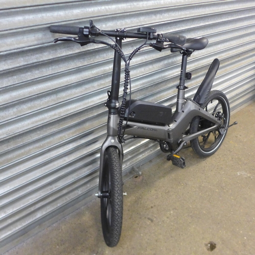 2127 - A Falcon Flo Stealth folding electric bike with keys, battery and charger