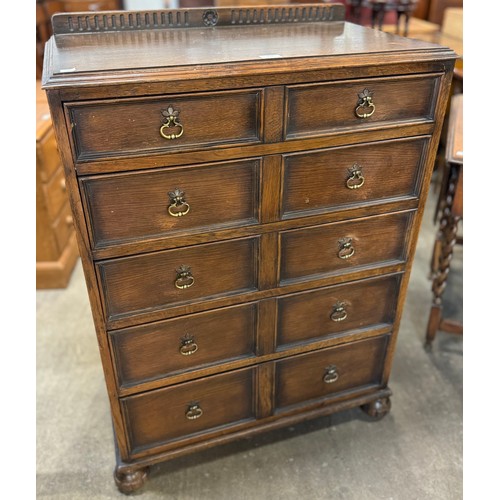 196 - A Jacobean Revival geometric moulded oak chest of drawers