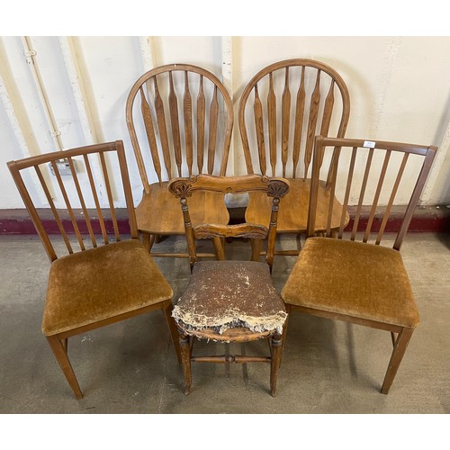 223 - A pair of beech dining chairs, a pair of oak kitchen chairs and one other