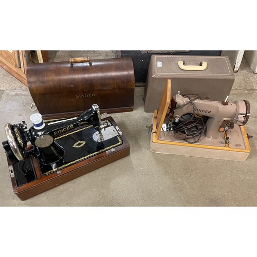 224 - A Singer sewing machine, model number RG163763 with all original accessories and paperwork, together... 