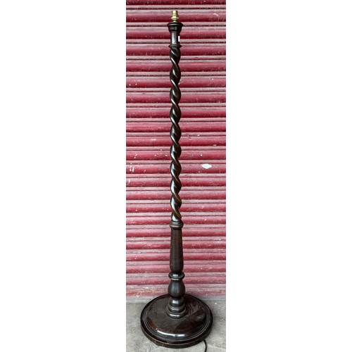 199 - A mahogany barleytwist standard lamp